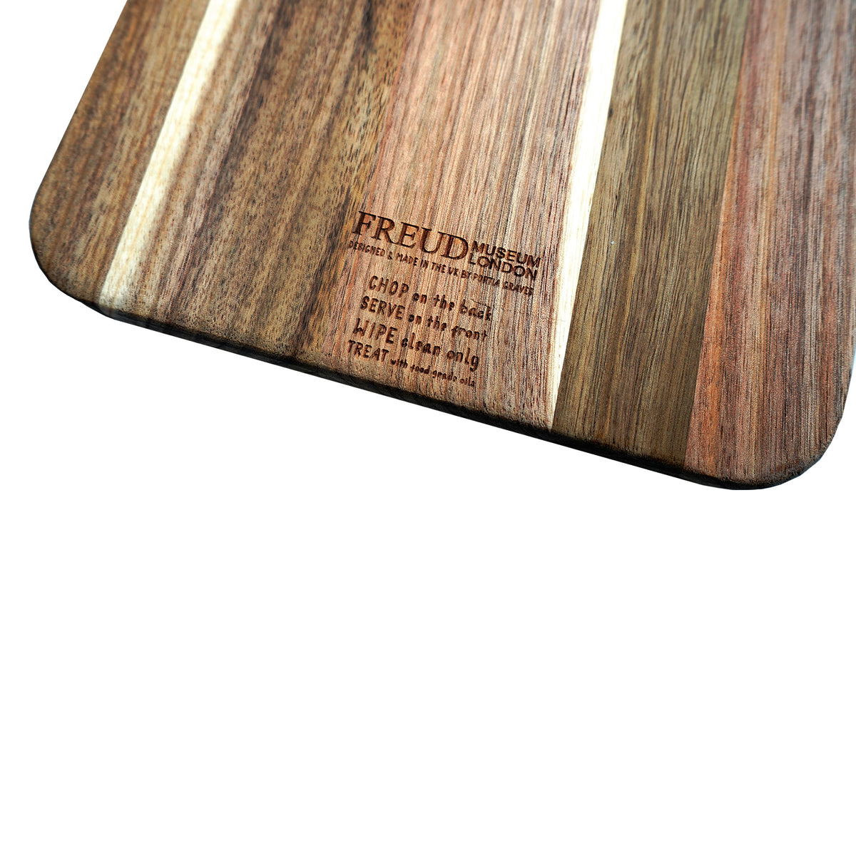 Wooden cutting board with 'Freud' branding and text on a white background