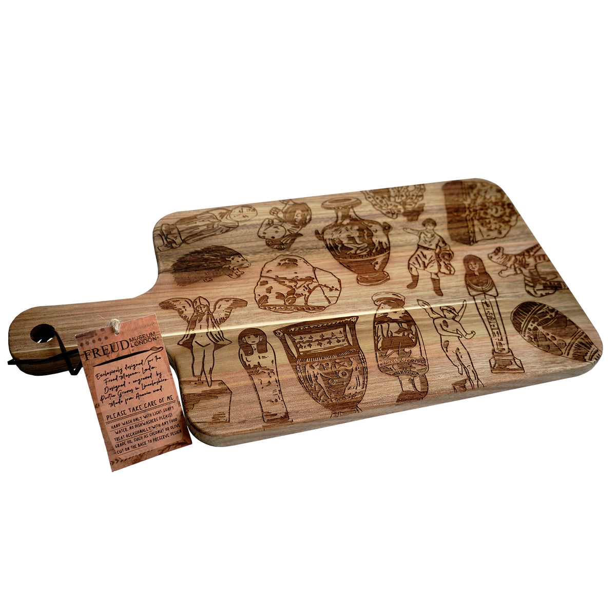Wooden cutting board with engraved designs from Freud Museum London