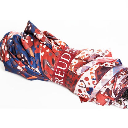 Umbrella with freudian couch rug pattern