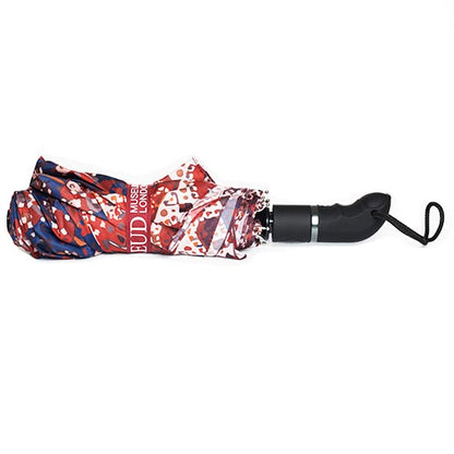 Umbrella with freudian couch rug pattern